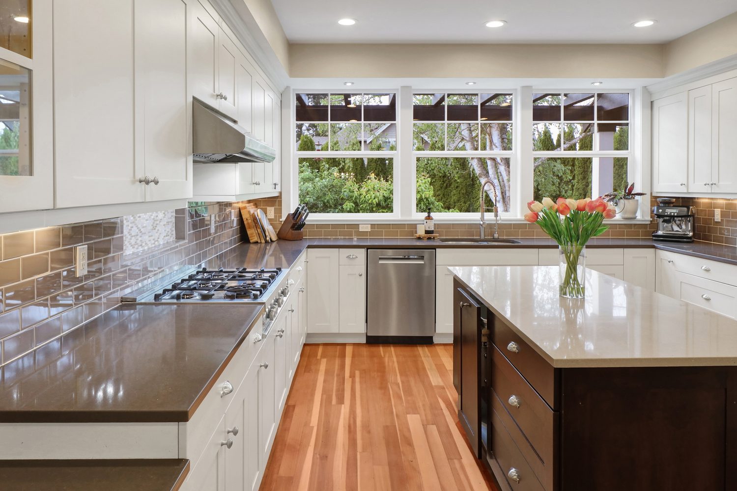 Kitchen counters and window-lined sink wall at Applegrove