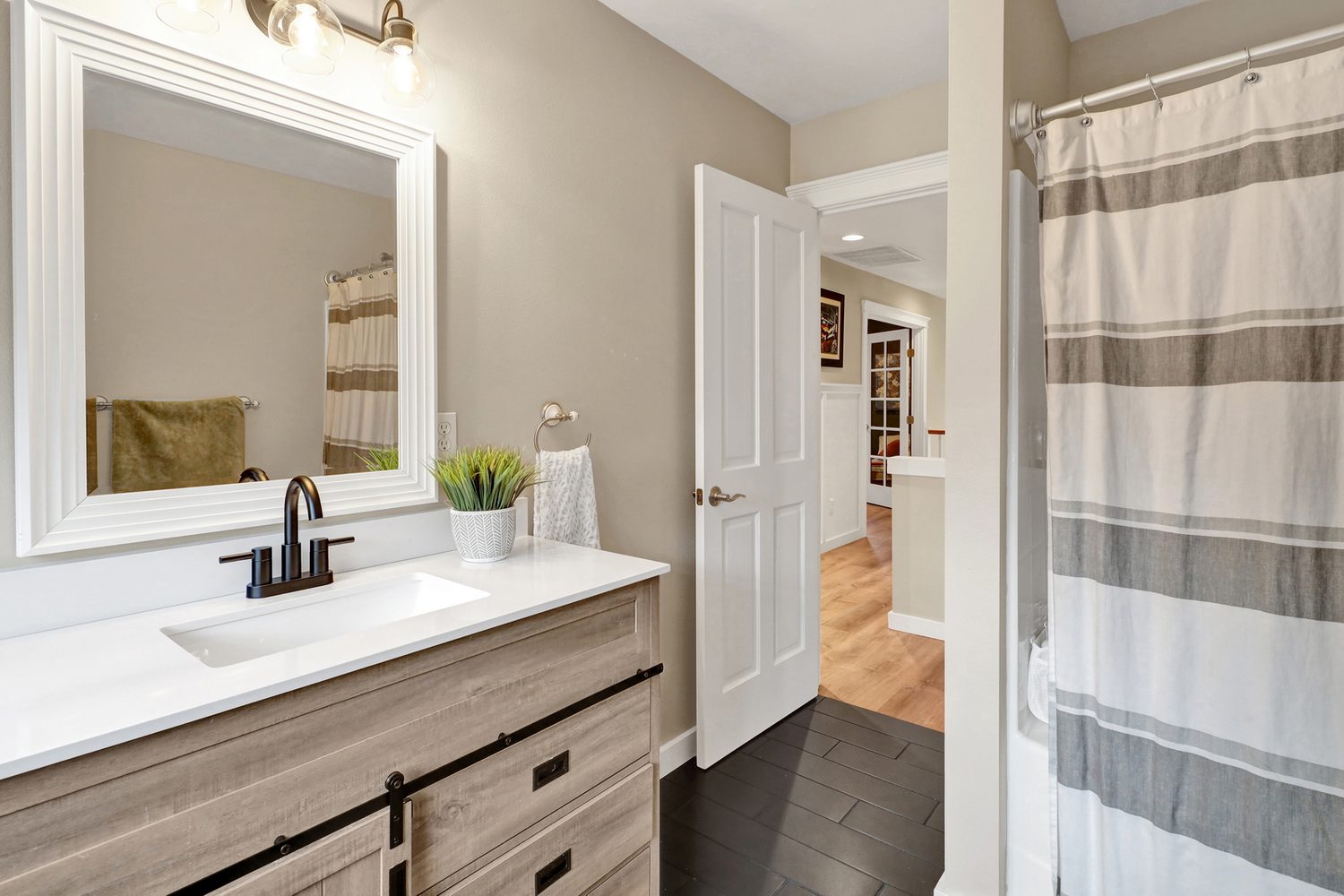 Upstairs bathroom vanity and shower at Applegrove