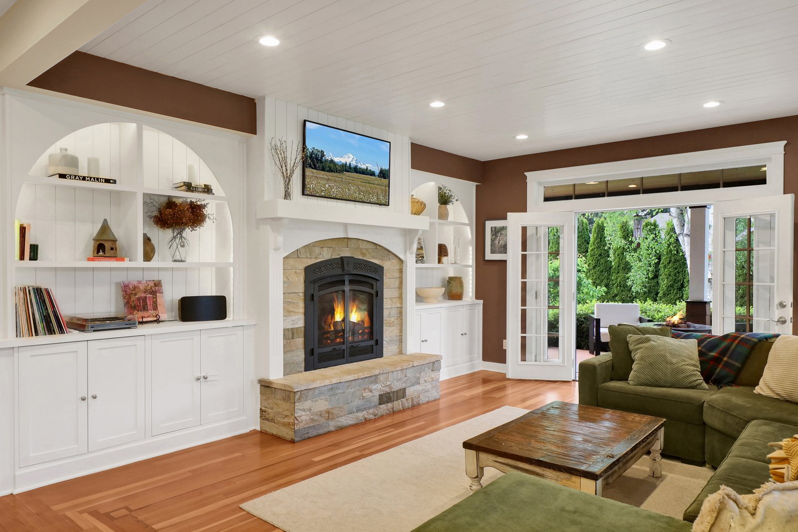 Living room with built-ins and fireplace