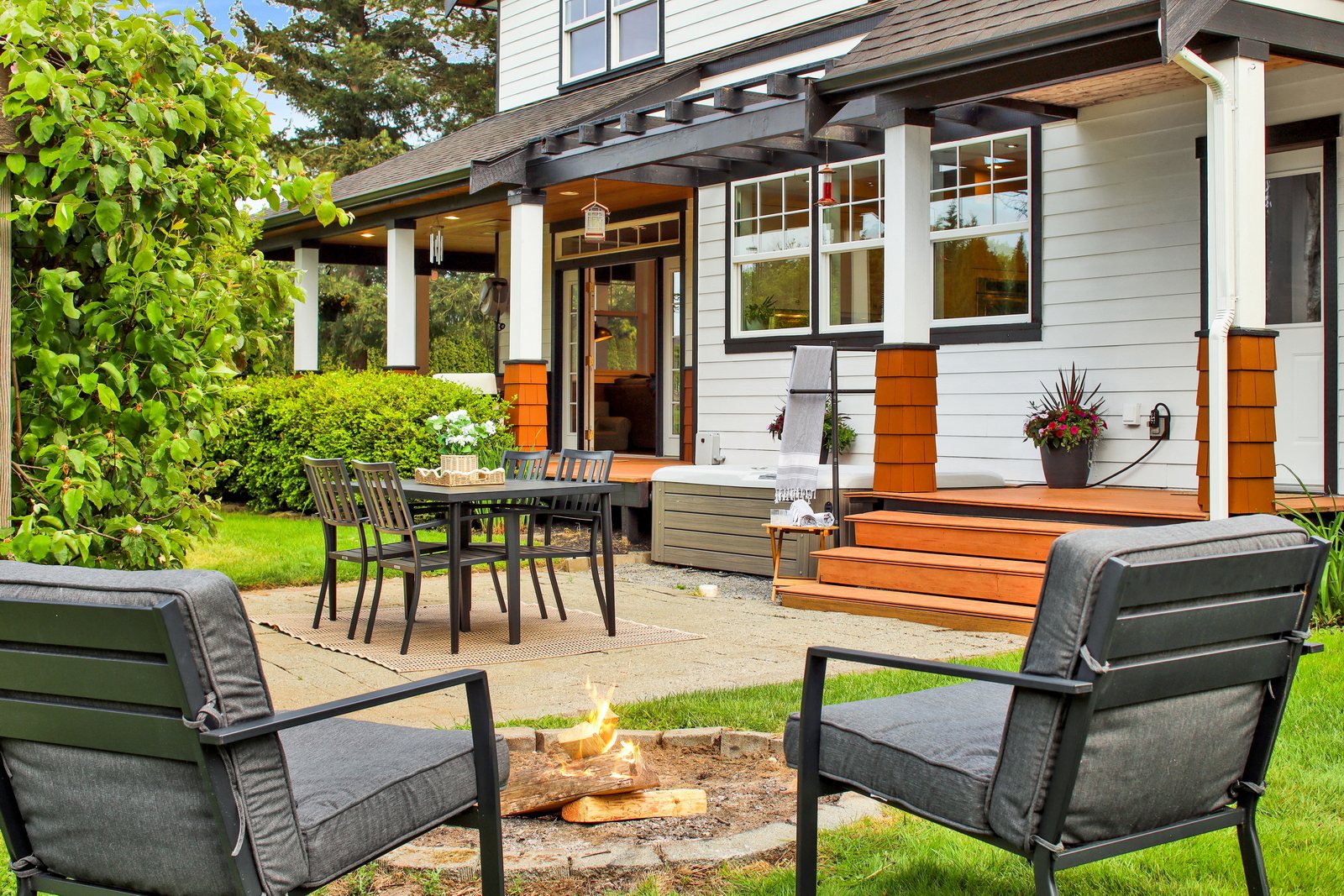 Patio and fire pit seating outside Applegrove