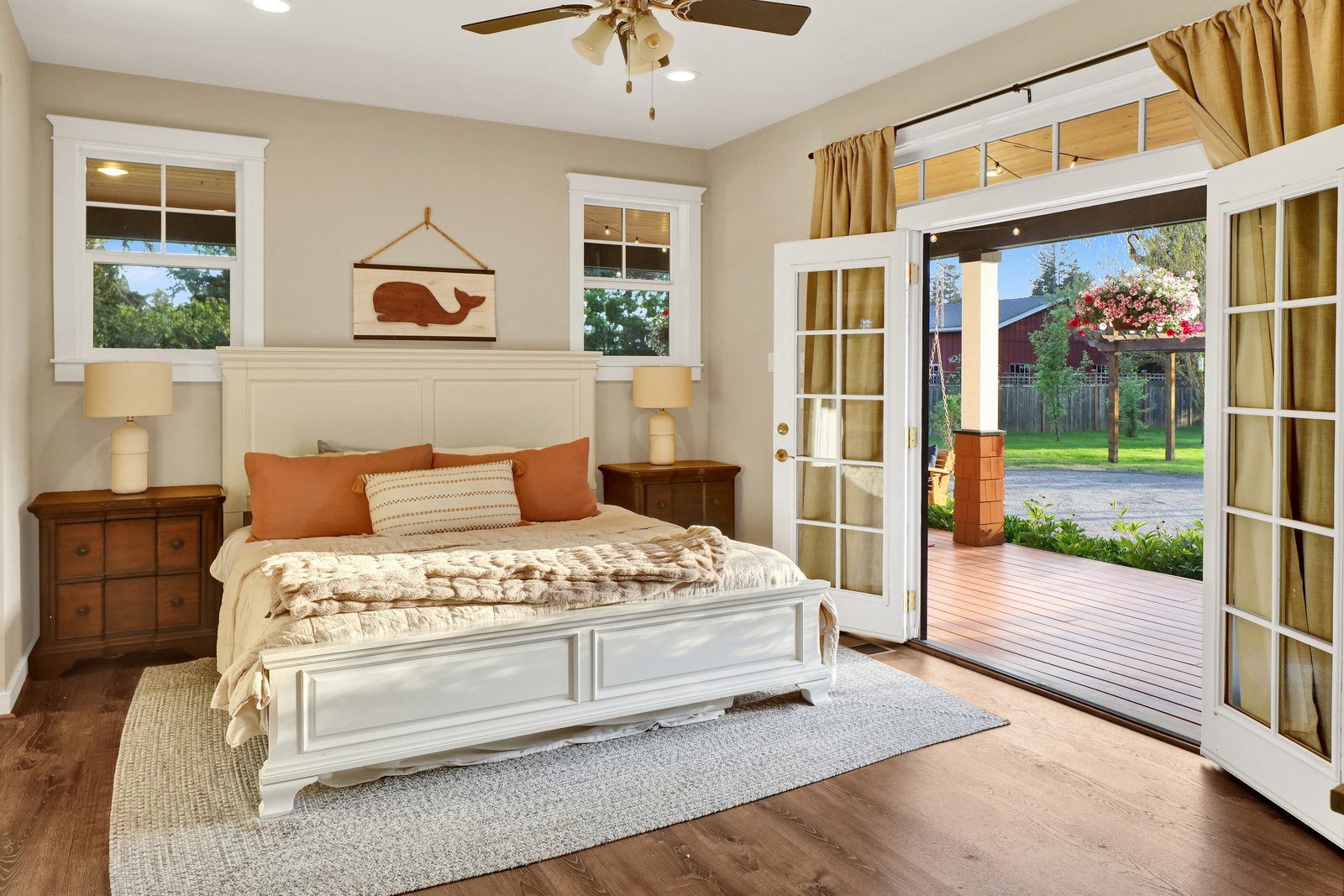 Primary bedroom with French doors to the porch